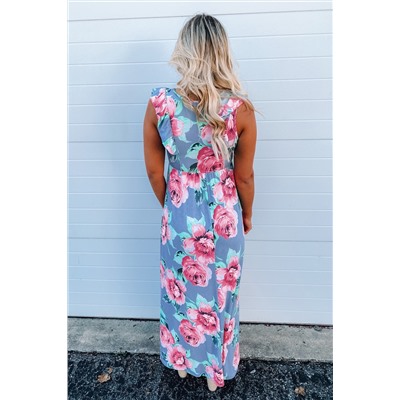 Голубое платье с завышенной талией и розовым цветочным принтом