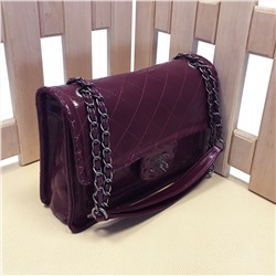 Элегантная сумка Shiboo из качественной натуральной кожи сливового цвета.