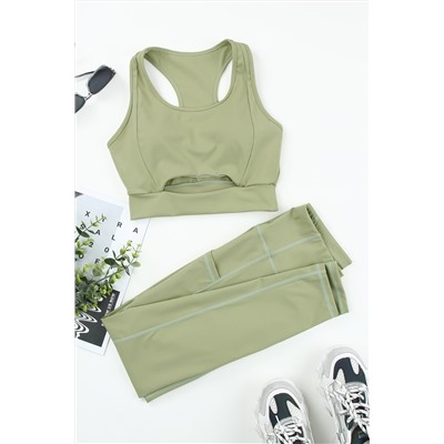 Зеленый спортивный комплект: топ + леггинсы с карманами