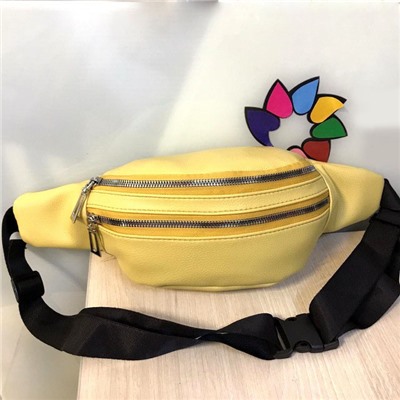 Поясная сумочка Mezalia из мягкой эко-кожи лимонного цвета.