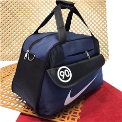 Спортивная сумка Fitness Coach с плечевым ремнём со вставками тёплого синего цвета.